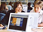 Mature Female Students Working on Computer