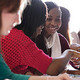 A student giving advice and support to another