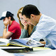 An undergraduate studying in a lecture theatre