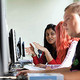 A row of computers with students sat at each one, they are attending the Medway computing workshop